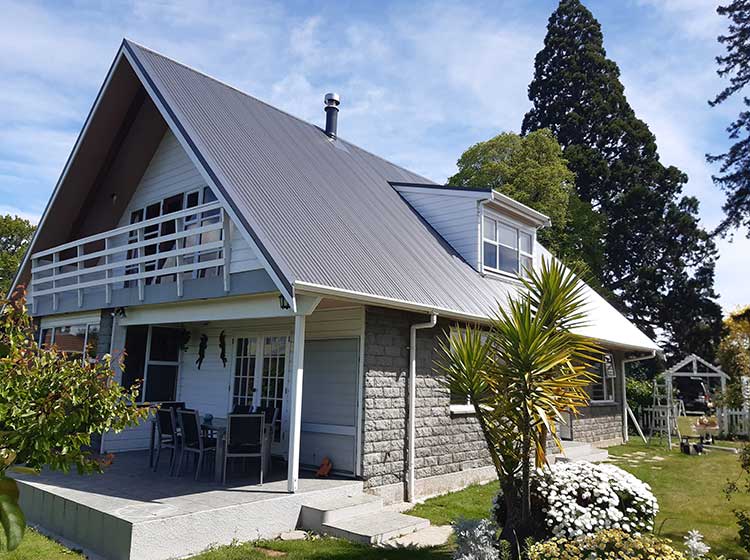 New steel roof installed after asbestos roof removal